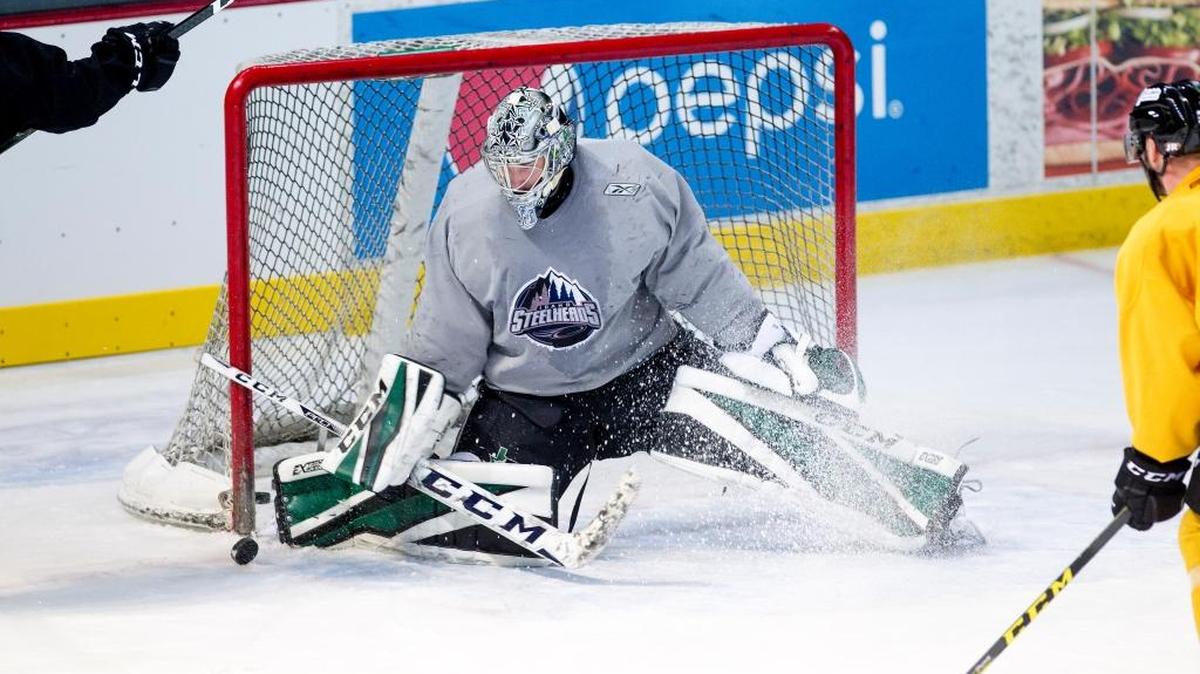 Idaho Steelheads goaltender Landon Bow makes a stop during practice in October.