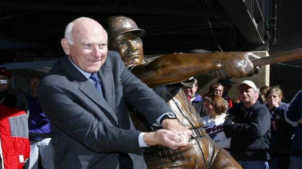 Harmon Killebrew poses with a statue of himself unveiled near Target Field on April 3, 2010, in Minneapolis. Killebrew, the Twins slugger and Payette native known for his tape-measure home runs, may soon have a Payette post office named after him.