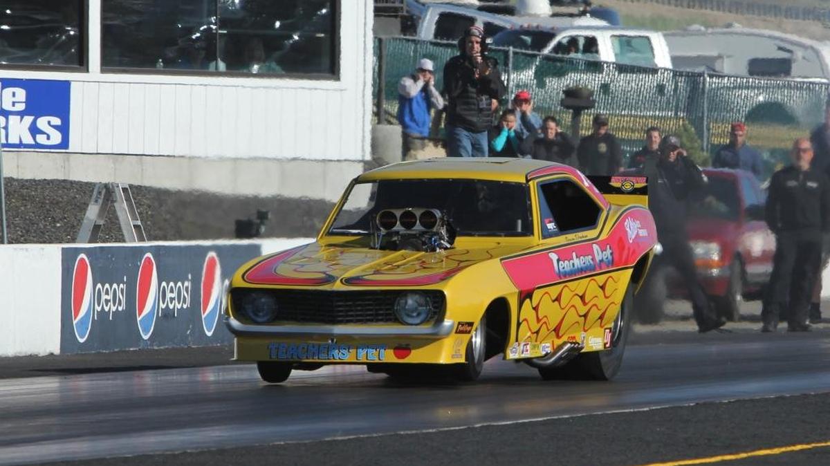 Steven Densham of Bellflower, Calif., races to a track-record elapsed time of 5.72-seconds at 248.39 mph.