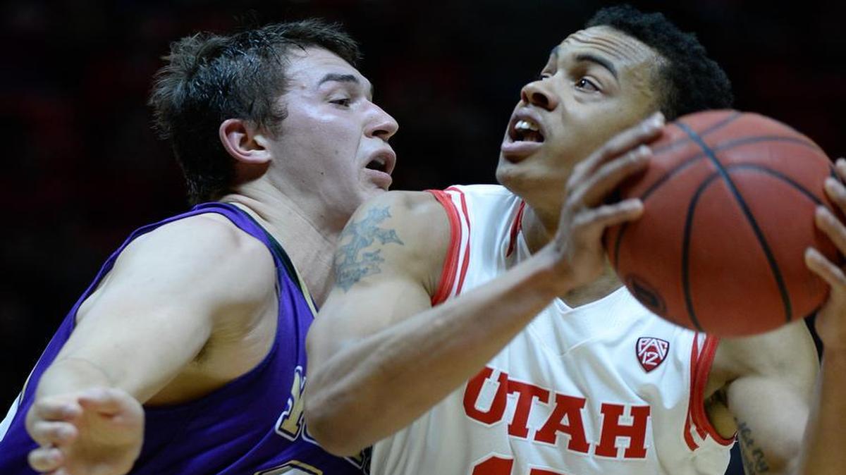 College of Idaho forward Joey Nebeker (20) puts pressure on Utah guard Lorenzo Bonam (15) during an NCAA college basketball game, Monday, Dec. 28, 2015 in Salt Lake City.