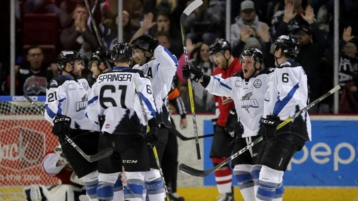 The Idaho Steelheads celebrate during a victory over the Rapid City Rush on Saturday night at CenturyLink Arena.
