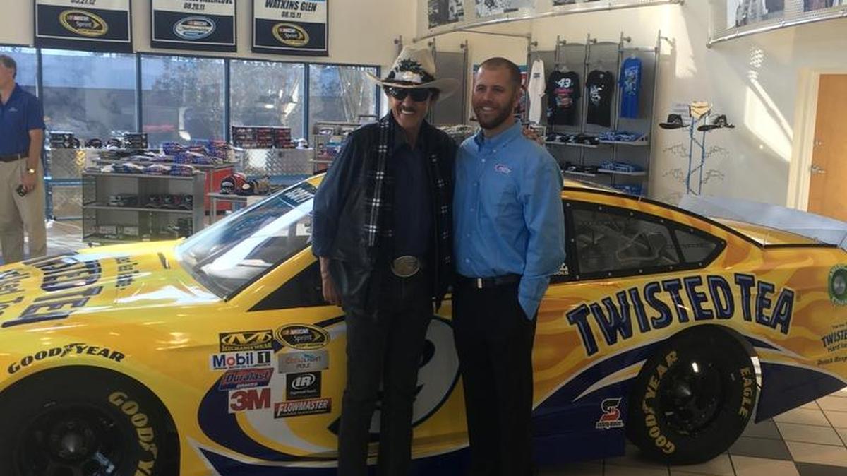 Richard Petty and Brian Scott at Petty’s shop Friday.
