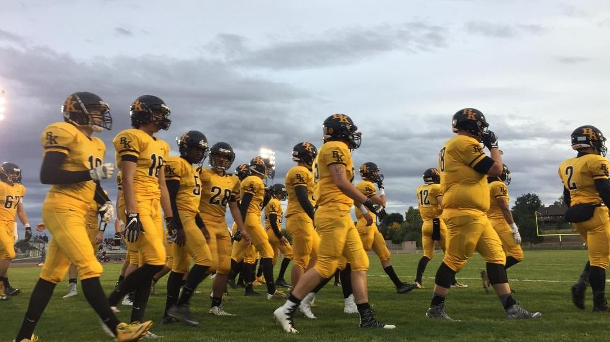 The Bishop Kelly High football team hits the field before Friday night’s 4A SIC game against Skyview.