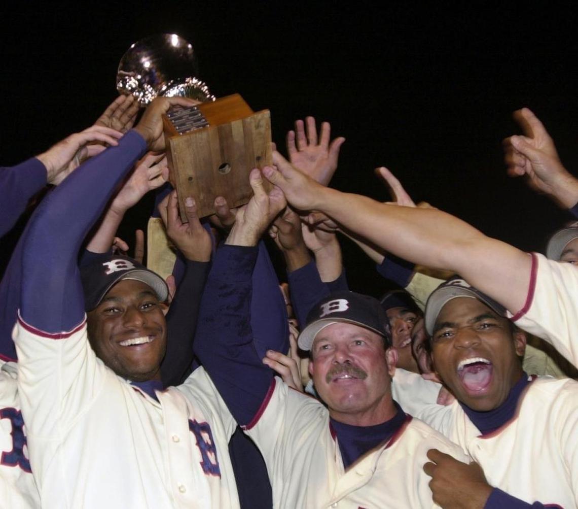 The Boise Hawks and manager Steve McFarland, center, celebrate winning the Northwest League championship at Memorial Stadium in 2002.