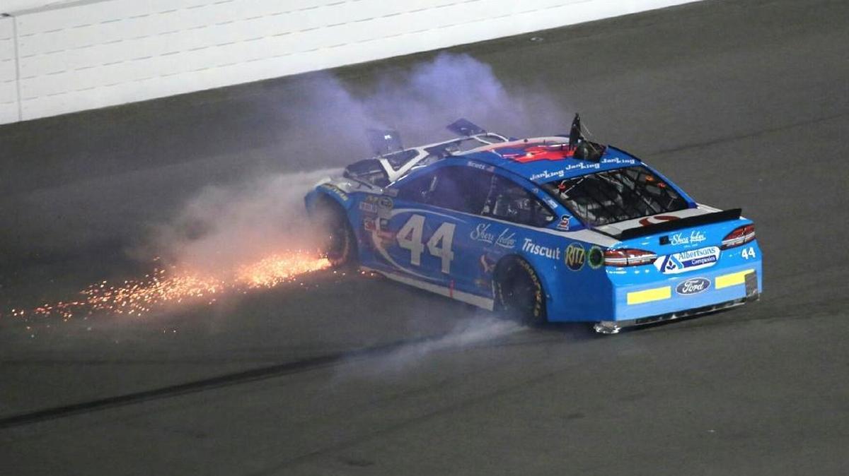 Brian Scott spins during the first of two qualifying races for Sunday’s NASCAR Daytona 500 Sprint Cup race at Daytona International Speedway in Daytona Beach, Fla., on Thursday, Feb. 18, 2016.