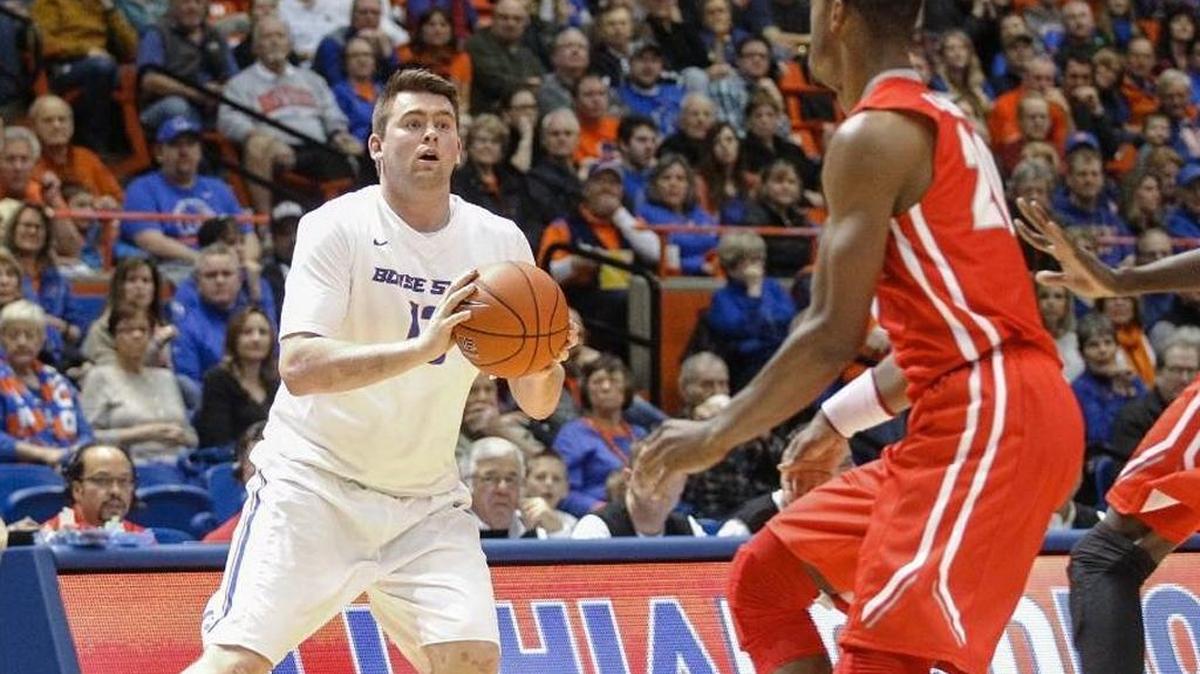 Boise State junior forward Nick Duncan pump fakes and looks to pass Saturday against New Mexico. He had a team-high 19 points in the loss.