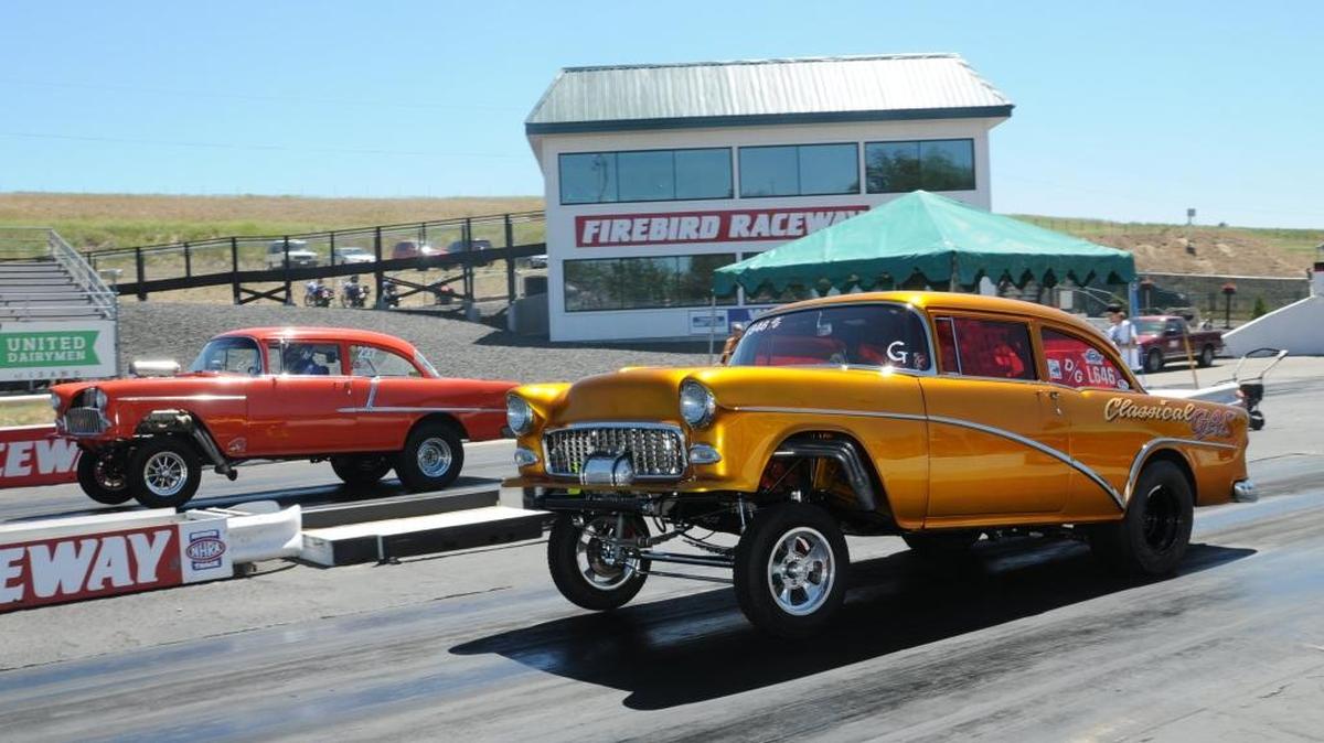 OLDIES BUT GOODIES DRAGS WRAP UP TODAY Eliminations for the 36th annual event begin at noon Sunday at Firebird Raceway. On Saturday, Mike O’Connor of Bend, Ore., captured the pole in AA/Supercharged qualifying, driving his ’57 Chevy to a 6.83-second elapsed time at 207.66 mph. Scott White of Seaside, Ore., was second at 7.10-197.39 with his ’41 Willys coupe. Admission is $12 adults, $5 children ages 6-12 and free for children 5 and younger. Above: Lonnie Gilbertson of Milwaukie, Ore., near lane, competes against Eagle’s Rob Coddens in a battle of 1955 Chevy Gassers.