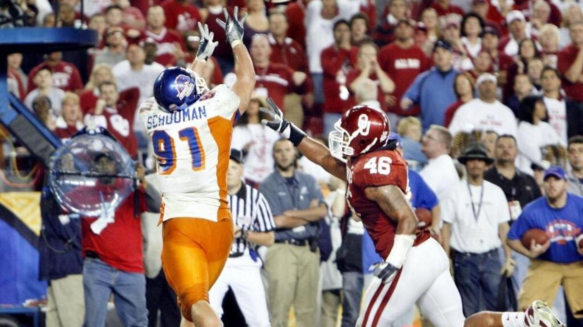 Boise State tight end Derek Schouman makes a touchdown catch in overtime against Oklahoma in the 2007 Fiesta Bowl. The TD set up the game-winning, two-point conversion by Ian Johnson.