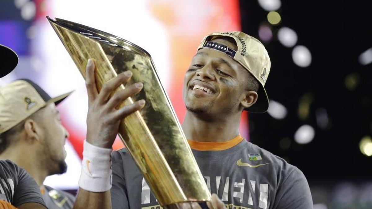 Clemson’s Deshaun Watson holds the championship trophy after the Tigers beat Alabama in the College Football Playoff championship game in January.
