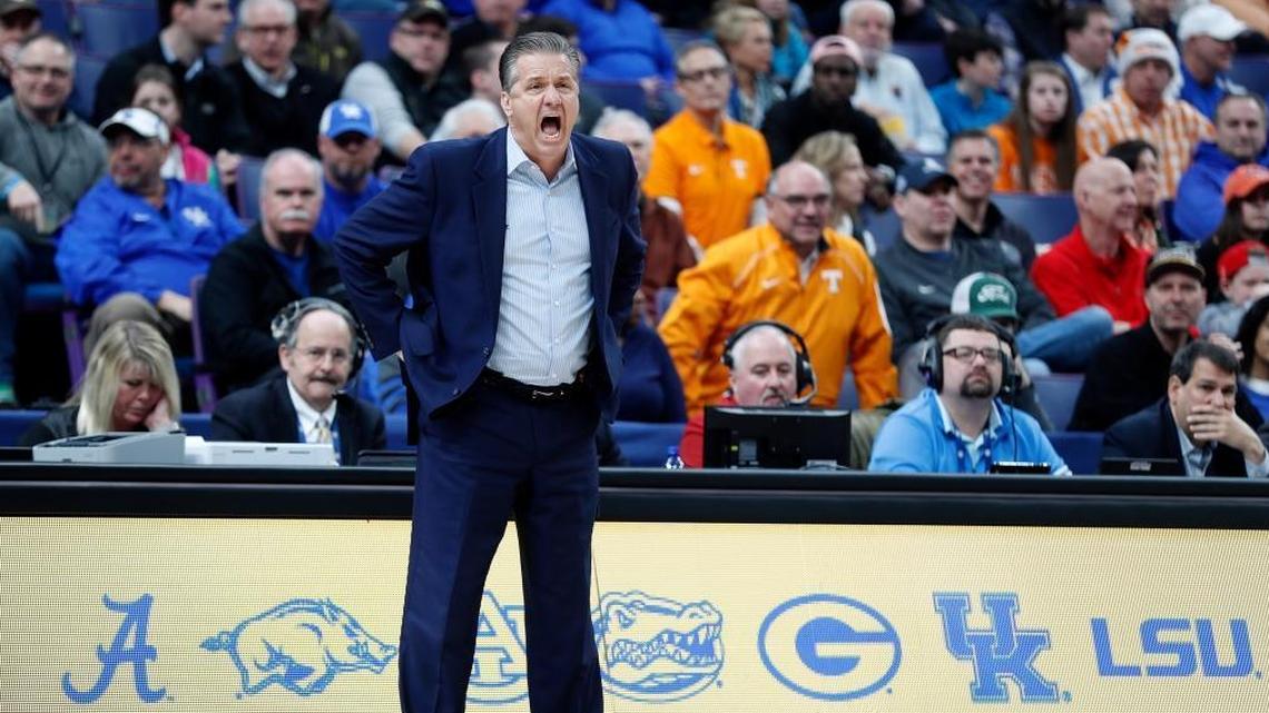 Kentucky head coach John Calipari yells to his players during the first half of the SEC championship game against Tennessee on Sunday in St. Louis.
