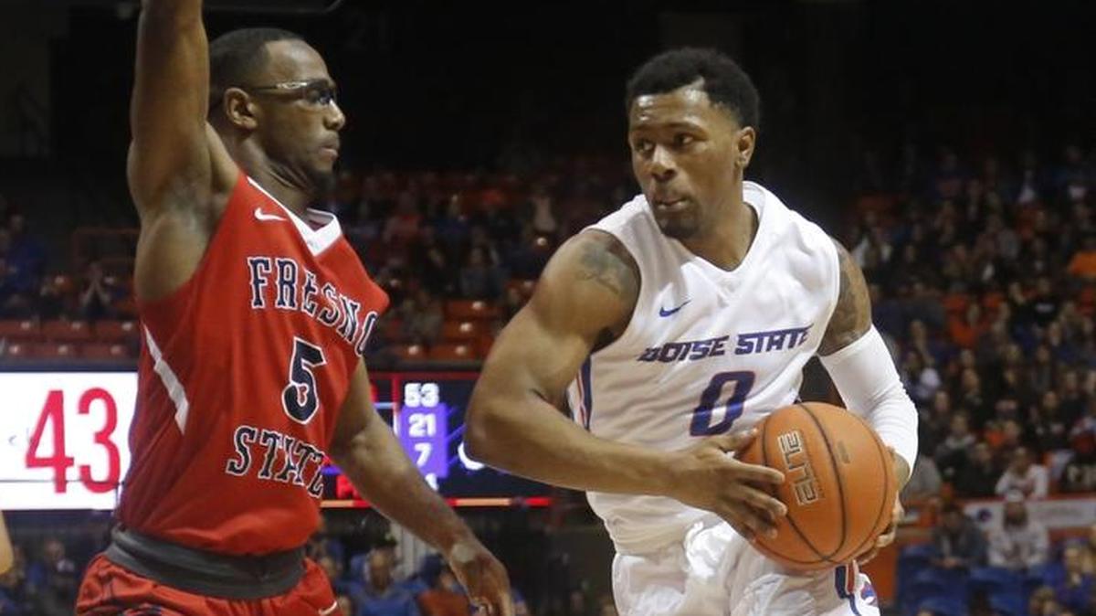 Boise State’s Marcus Dickinson drives past Fresno State’s Jahmel Taylor on Feb. 28, 2017, at Taco Bell Arena in Boise.