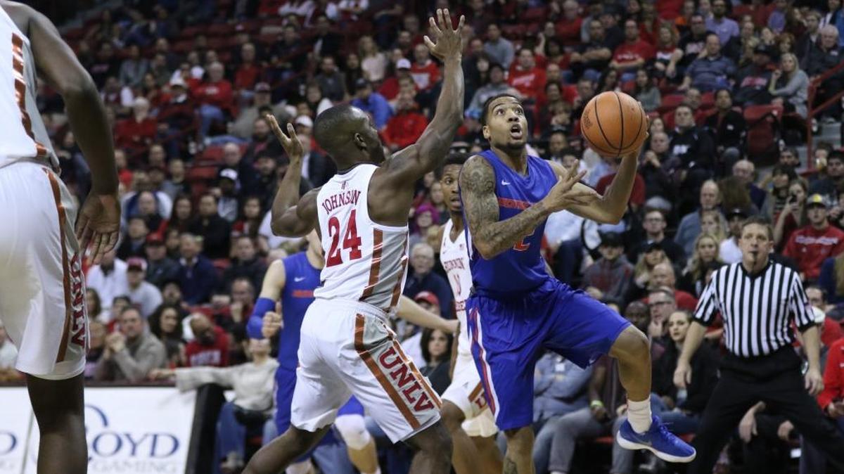 Boise State guard Lexus Williams drives to the basket in the first half at UNLV on Saturday at the Thomas & Mack Center in Las Vegas.