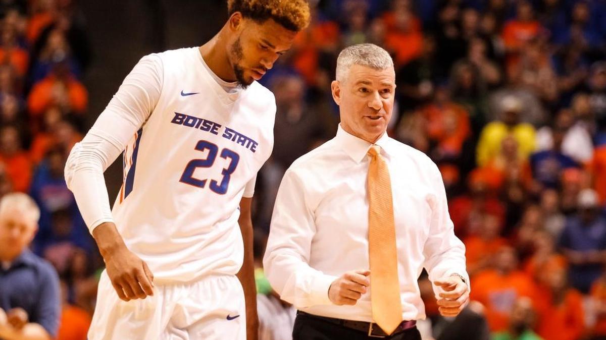 Boise State’s James Webb III and coach Leon Rice talk during a break in the first half of a their college basketball game against Oregon in Boise on Saturday, Dec. 12, 2015. Boise State won 74-72.