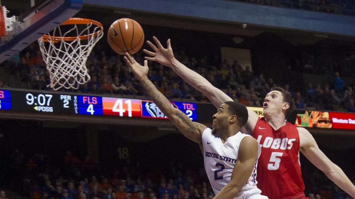 Boise State guard Lexus Williams drives against New Mexico forward Joe Furstinger on Jan. 3 at Taco Bell Arena. The Broncos are on the road for their next two games.