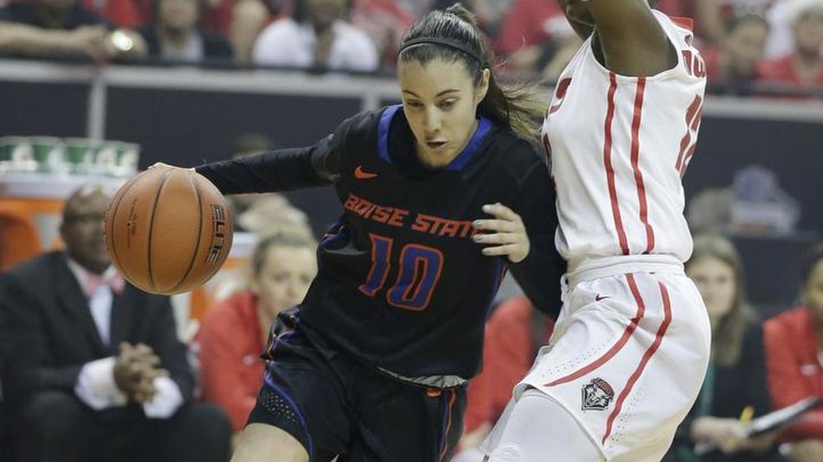 Boise State’s Yaiza Rodriguez, of Spain, drives past New Mexico’s Bryce Owens during the first half of the Mountain West Tournament championship game last March in Las Vegas. Boise State defeated New Mexico 66-60.