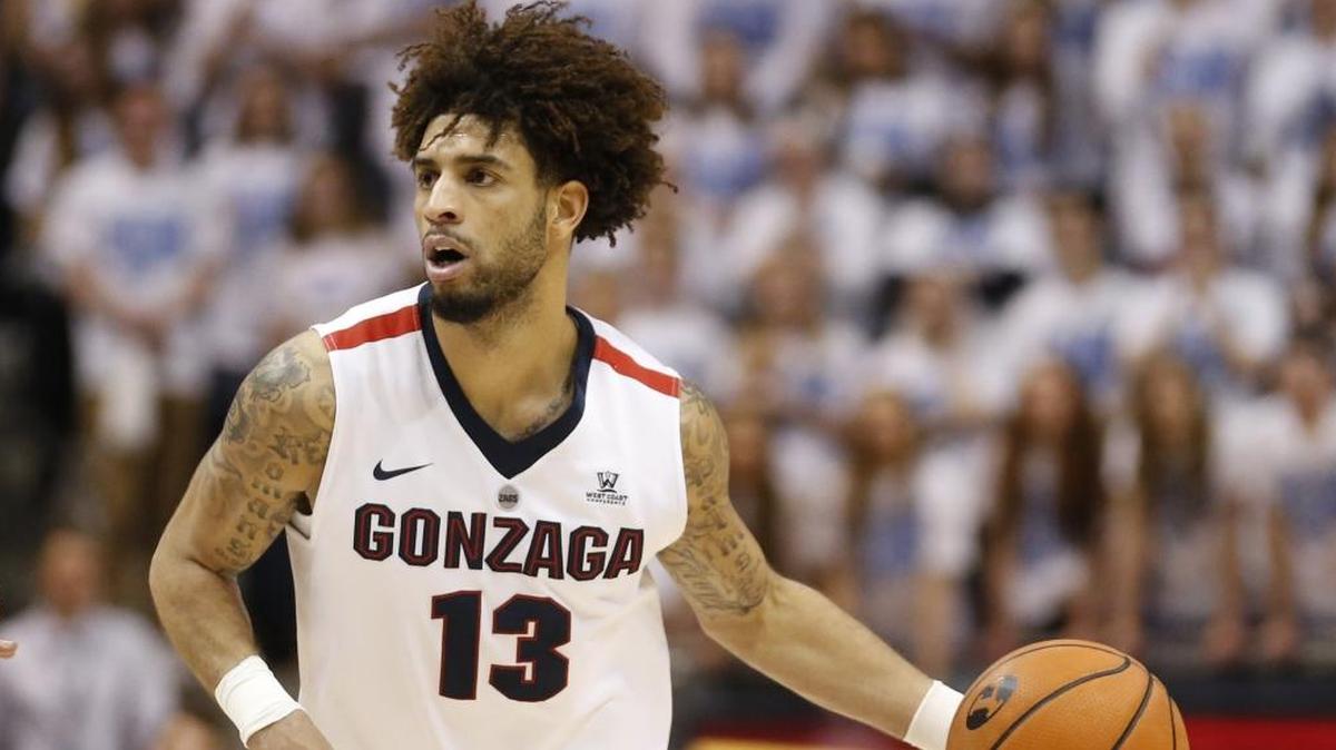 Gonzaga guard Josh Perkins brings the ball upcourt against BYU on Feb. 24 in Provo, Utah. Gonzaga is reportedly considering a move to the Mountain West Conference.