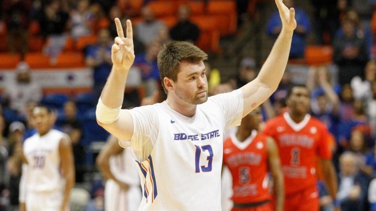 Boise State senior Nick Duncan waves to the crowd after he fouls out Tuesday against Fresno State. Duncan scored four points in his final regular season appearance at Taco Bell Arena.