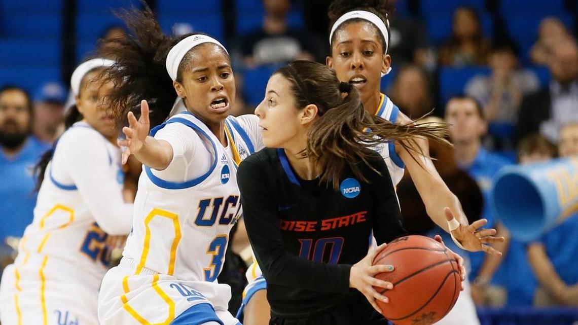 UCLA guard Jordin Canada, left, and UCLA forward Monique Billings, right, defend Boise State guard Yaiza Rodriguez Ortego, center, during the first half of a first-round game in the NCAA women’s college basketball tournament, Saturday, March 18, 2017, in Los Angeles.
