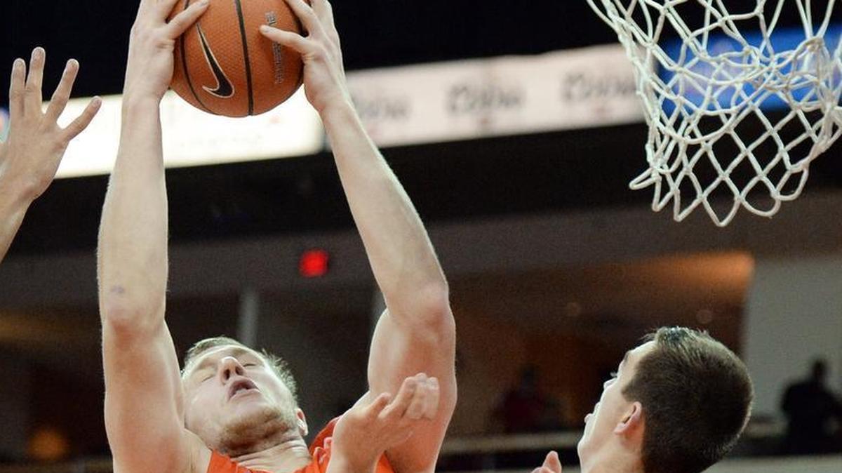 Boise State’s Chris Sengfelder, left, comes down with a rebound with teammate Justinian Jessup close by during their game against Fresno State at the Save Mart Center in Fresno on Tuesday.
