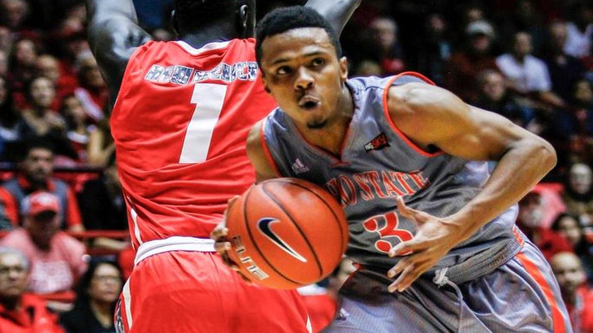 Idaho State’s Ethan Telfair (3) drives to the basket past New Mexico’s Aher Uguak (1) during the first half of an NCAA college basketball game in Albuquerque, N.M., on Friday, Nov. 11, 2016. Telfair had 25 points, 12 rebounds, 10 assists and six steals in the Bengals’ 81-70 loss.