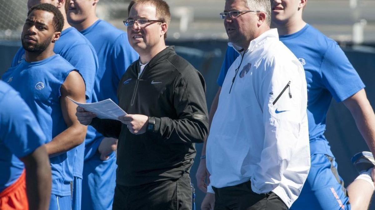 Eliah Drinkwitz, left, worked for Bryan Harsin the past three years at Boise State and Arkansas State.