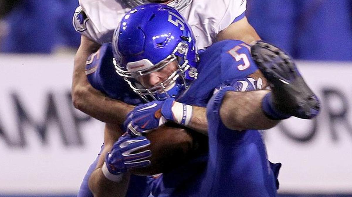 Boise State’s Ben Weaver intercepts an Air Force pass in the fourth quarter of last year’s game at Albertsons Stadium. Weaver has a team-high 92 tackles in his senior season to lead a depleted linebacking corps that meets a Falcons attack that can run or pass for big gains.