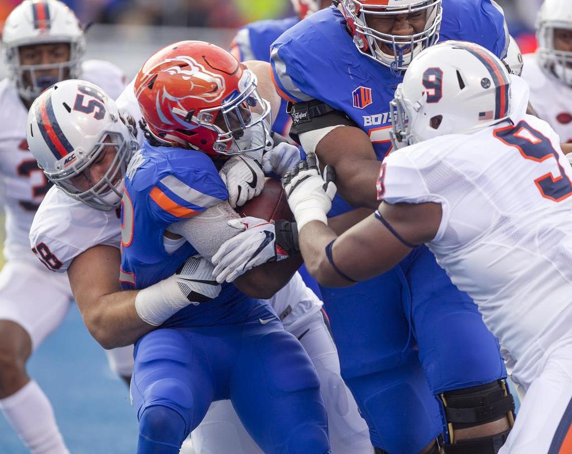 Boise State running back Alexander Mattison goes nowhere in the loss two weeks ago to Virginia.