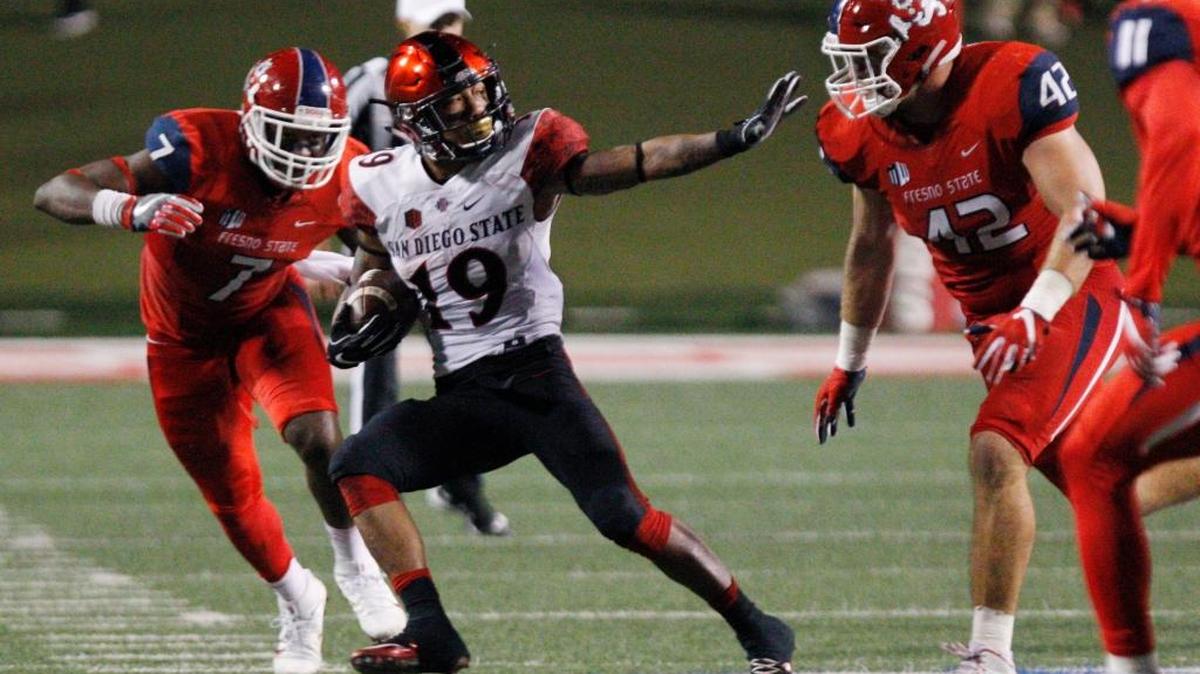 Donnel Pumphrey rushed for 220 yards and two touchdowns, surpassing 1,000 yards for the season and moving into the NCAA Top 10 for his career, leading San Diego State (5-1, 2-0 Mountain West) to a 17-3 win over Fresno State (1-6, 0-3) on Friday night in Fresno, Calif. With his third 200-yard game of the season, Pumphrey now has 1,111 in six games to raise his career total to 5,383, passing LaDanian Tomlinson, Herschel Walker and Archie Griffin to move into eighth on the NCAA list. San Diego State had 292 yards on the ground and held the ball for almost 15 more minutes than the Bulldogs, who had three turnovers.