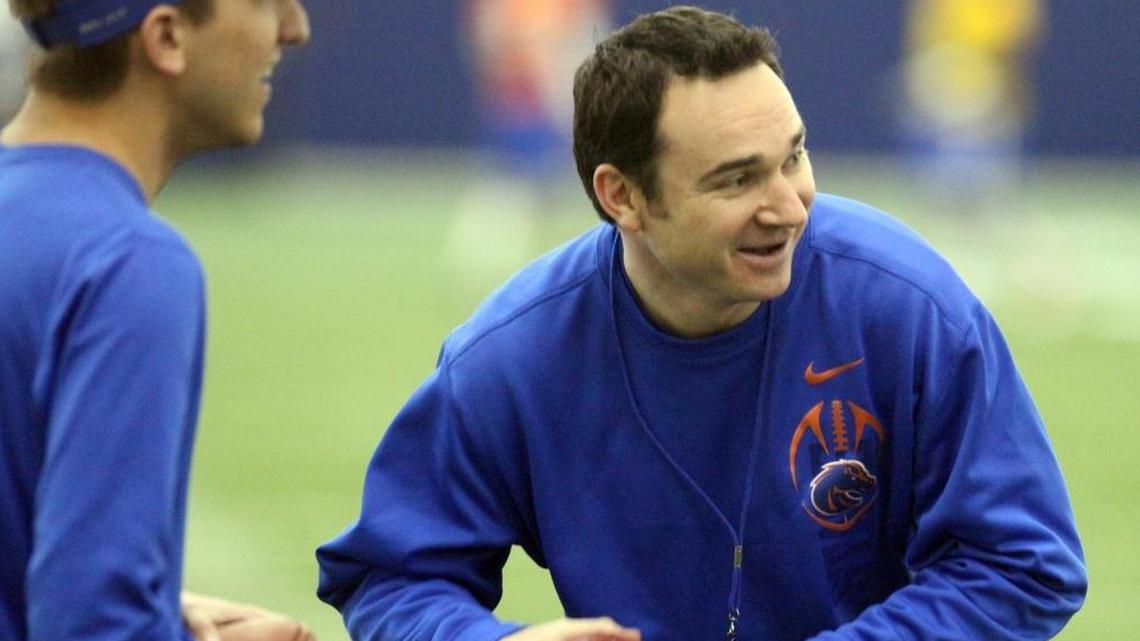 Boise State quarterbacks coach Jonathan Smith works with the team in 2012.