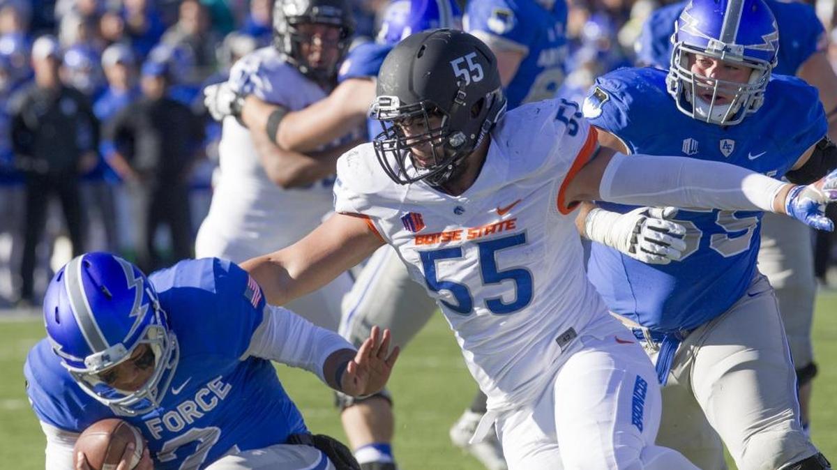 Boise State nose tackle David Moa (55) sacks Air Force quaterback Arion Worthman in the first quarter Friday, Nov. 25, 2016 at Falcon Stadium in Colorado Springs.