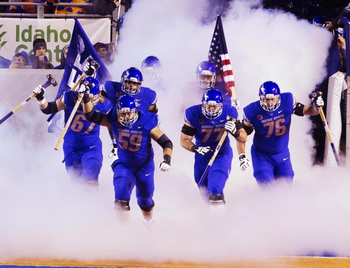 The Boise State offensive linemen carried the Hammer on Saturday night before the Air Force game — and each got his own.