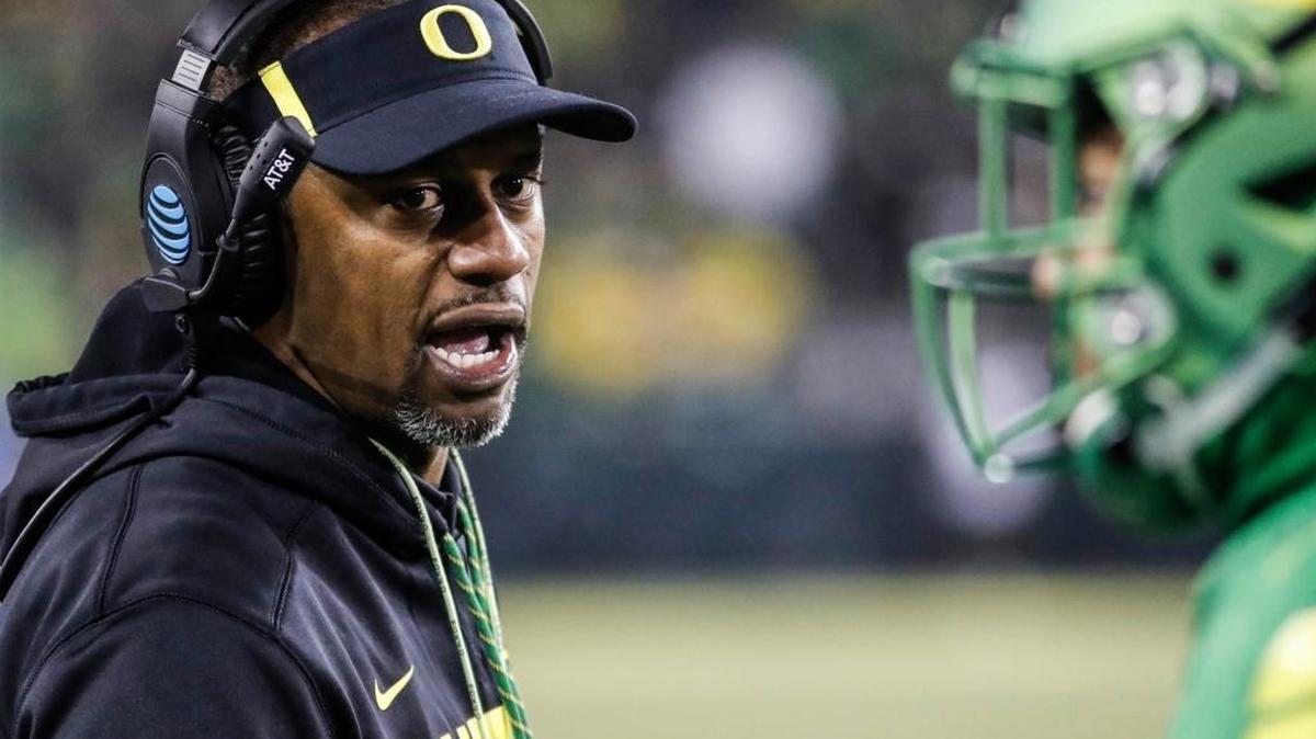 Oregon football coach Willie Taggart gives feedback from the sidelines against Oregon State on Nov. 25 in Eugene, Ore.