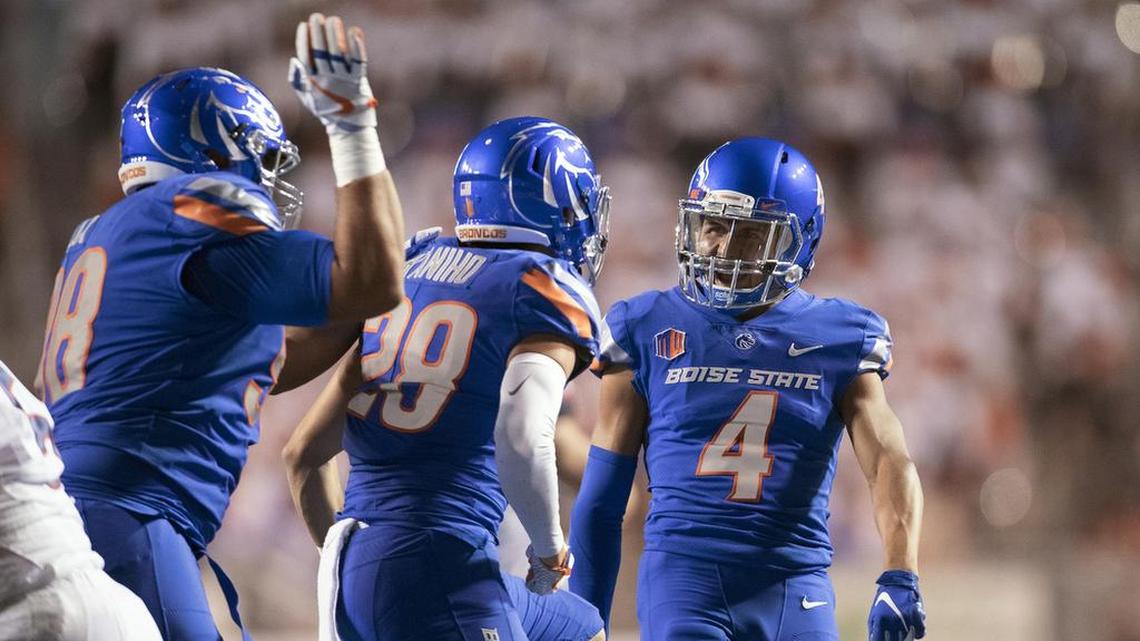 Boise State safety DeAndre Pierce celebrates a tackle for loss against UConn with nickel Kekaula Kaniho in the Broncos’ 2018 home opener. On Thursday, Boise State confirmed that Pierce has entered the transfer portal.