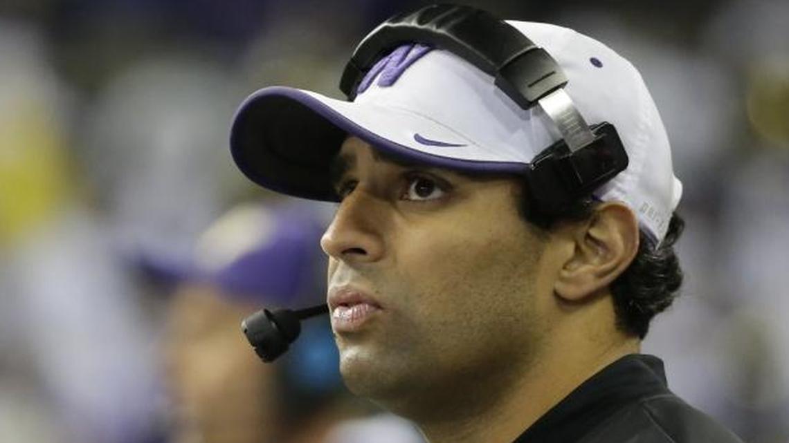Washington wide receivers coach Bush Hamdan stands on the sideline during a game against Arizona State on Nov. 19, 2016, in Seattle. Washington beat Arizona State 44-18.