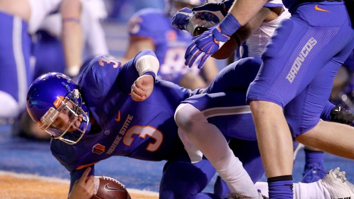 Boise State’s Tommy Stuart runs the ball into the end zone against Air Force in the fourth quarter Friday Nov. 20, 2015, at Albertsons Stadium in Boise.