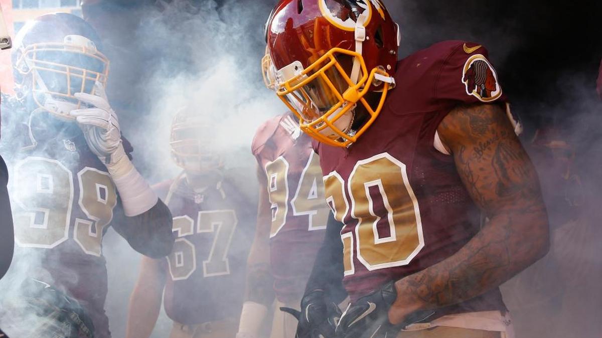 Washington Redskins defensive back Jeron Johnson (20) waits for his introduction before an NFL football game against the Tampa Bay Buccaneers in Landover, Md., Sunday, Oct. 25, 2015.