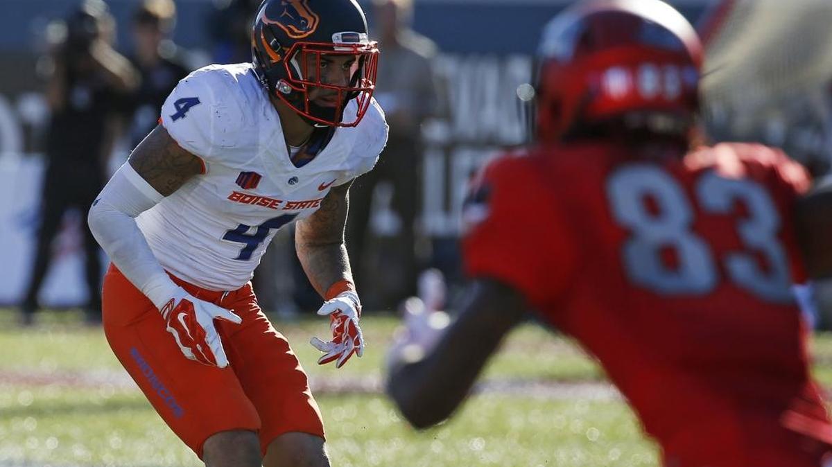 Boise State safety Darian Thompson, left, the Mountain West-leader for interceptions, is a contender for the MW defensive player of the year.