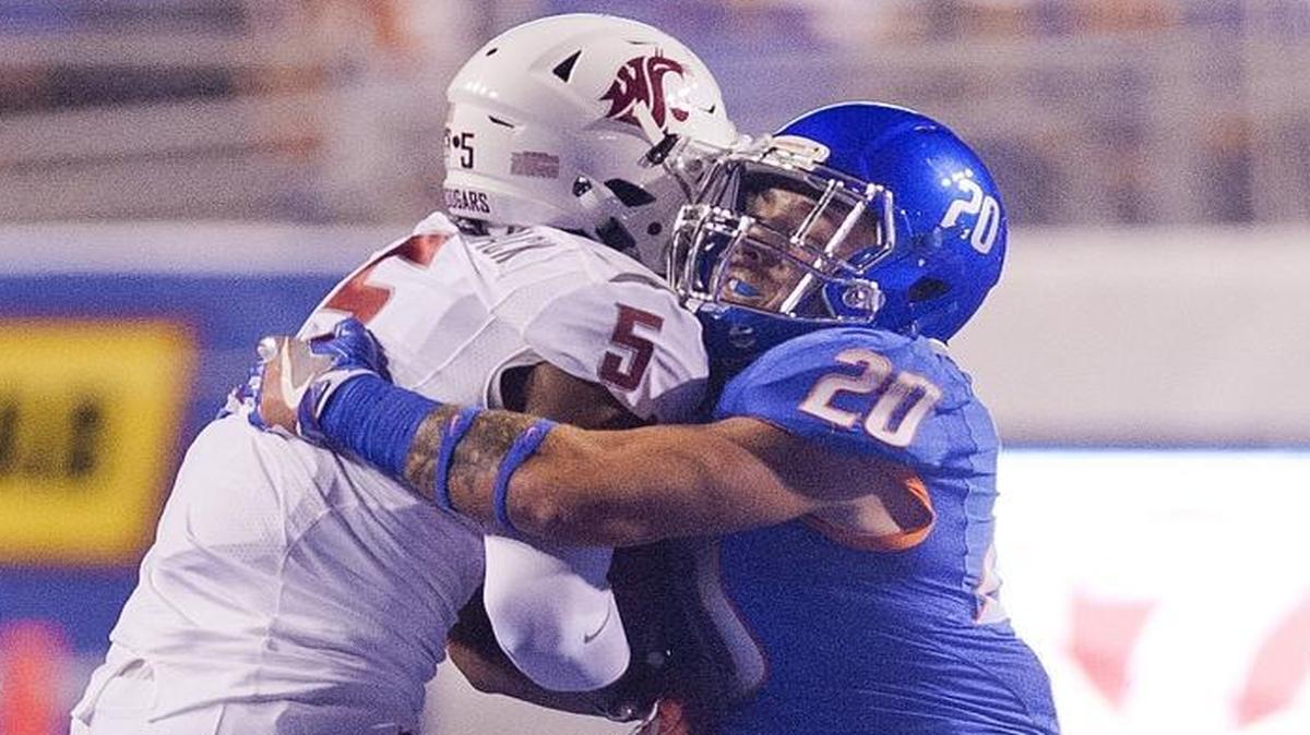Boise State linebacker Tanner Vallejo stops Washington State wide receiver Isaiah Johnson-Mack during their game at Albertsons Stadium on Saturday, Sept. 10, 2016.