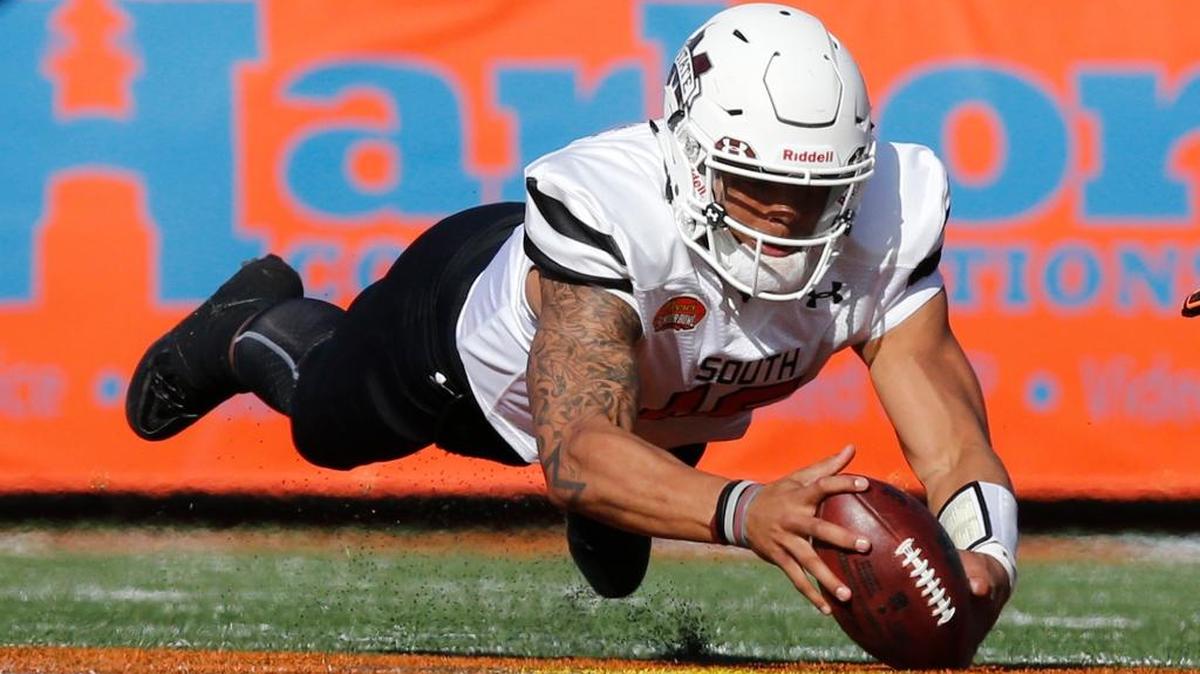 Mississippi State quarterback Dak Prescott, above, threw for 61 yards and a touchdown and helped lead the South team to a 27-16 victory over the North on Saturday in Mobile, Ala.