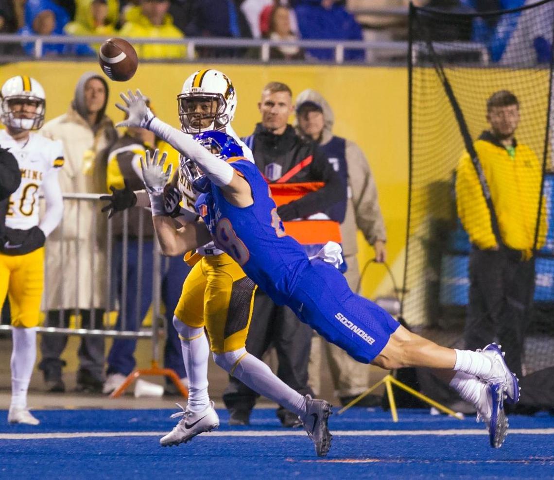 Boise State safety Kekaula Kaniho deflects a pass intended for Wyoming wide receiver Austin Conway on Oct. 21 against Wyoming at Albertsons Stadium.