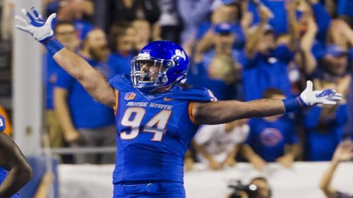 Boise State defensive end Sam McCaskill (94) celebrates a blocked Washington State field goal with defensive tackle Elliot Hoyte (96) and the Bronco defense Saturday, Sept. 10, 2016 in Boise.