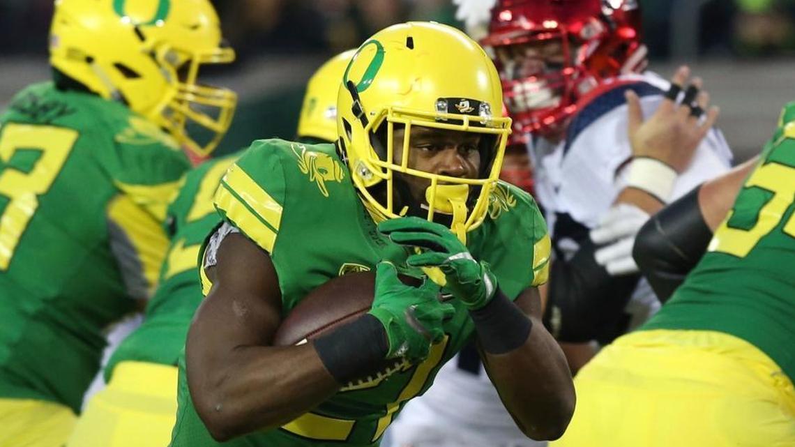 Oregon running back Royce Freeman breaks for a touchdown against Arizona during the first quarter Nov. 18 in Eugene, Oregon.