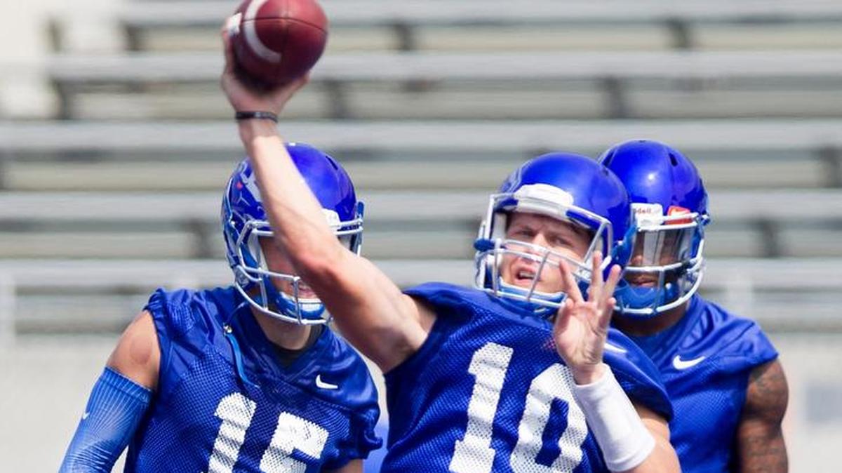 Chase Cord throws a pass during Boise State football practice at Albertsons Stadium on Aug. 9, 2017.