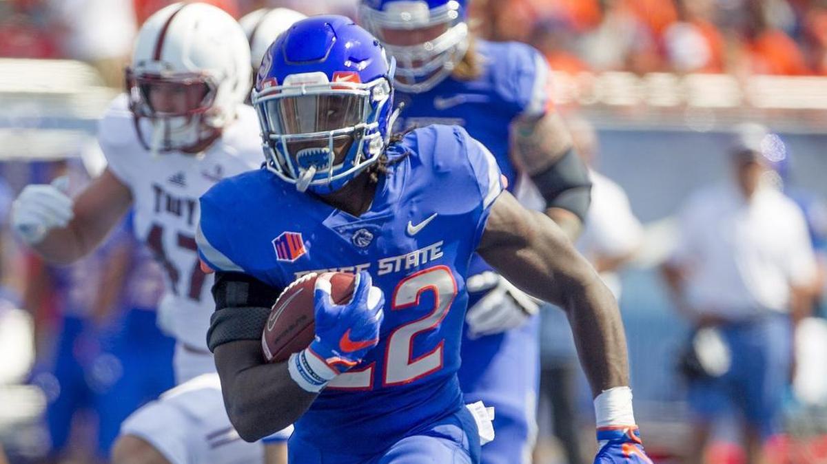 Boise State running back Alexander Mattison (22) scores on a 49-yard touchdown run during the 2017 home opener against the Troy Trojans at Albertsons Stadium in Boise.
