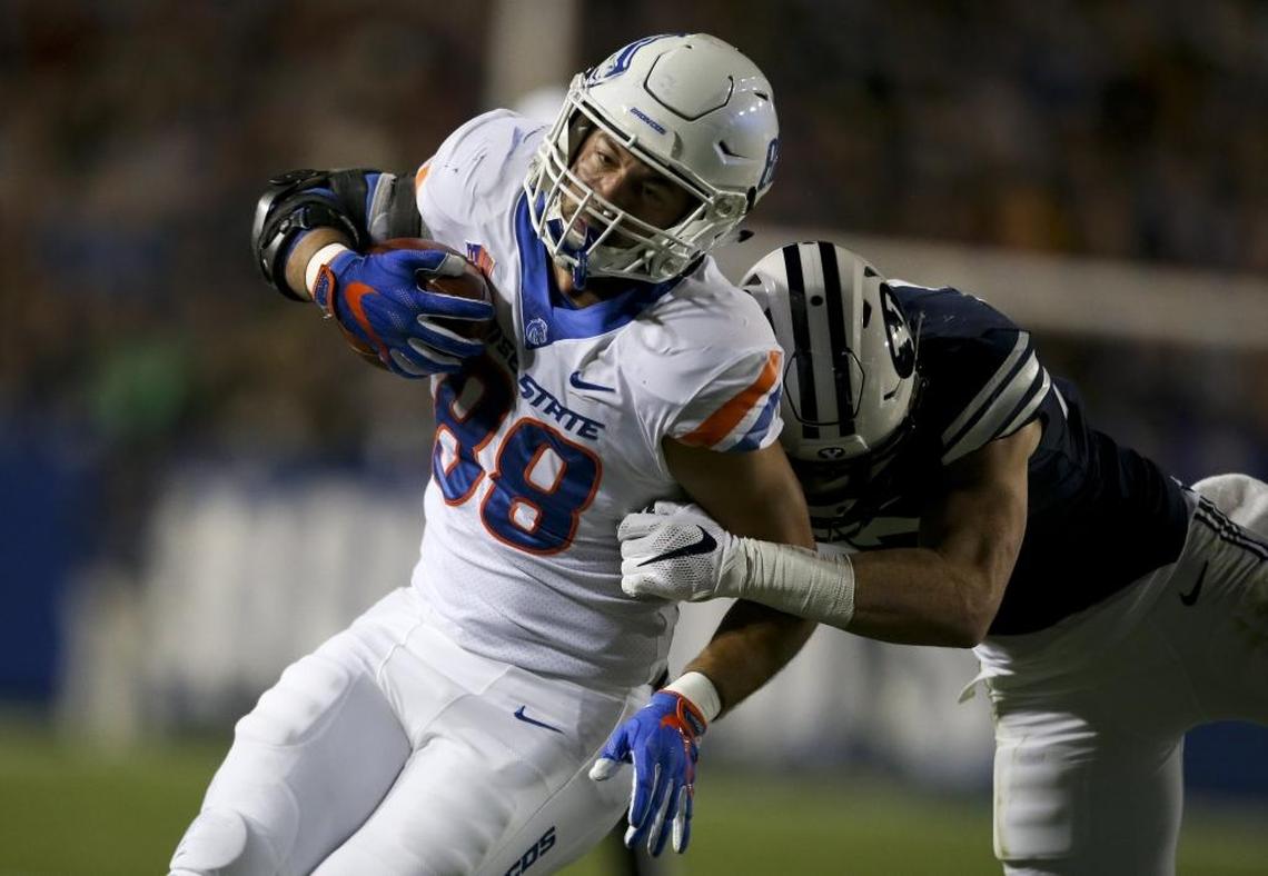 Boise State tight end Jake Roh (88) is taken down by a BYU defender Oct. 6 at LaVell Edwards Stadium in Provo, Utah.