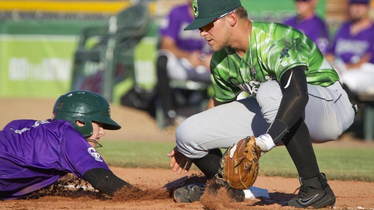 Joe Martarano scoops a ball out of the dirt while playing first base with the Eugene Emeralds on June 20 at Memorial Stadium against the Boise Hawks.