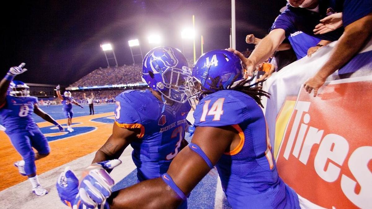 Boise State cornerback Tyler Horton (14) and safety Chanceller James (3) celebrate Horton’s 85-yard interception for a touchdown against the Washington State Cougars during the game at Albertsons Stadium. Saturday, September 10, 2016.