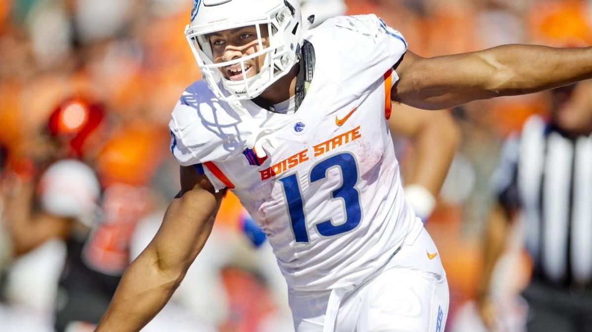 Boise State Broncos running back Jeremy McNichols (13) celebrates after a 70-yard touchdown run, his fourth touchdown of the first half during the game at Reser Stadium in Corvallis, Ore. Boise State defeated Oregon State 38-24. Saturday, Sept. 24, 2016.