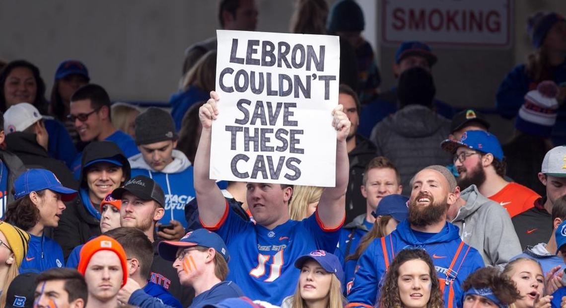 Boise State fan Greg Hart holds up a sign during the game Sept. 22 against Virginia at Albertsons Stadium.