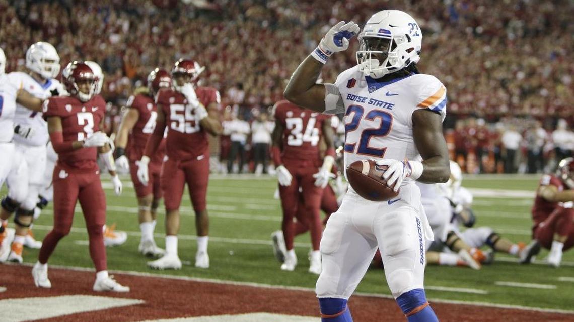 Boise State running back Alexander Mattison (22) celebrates after scoring a touchdown during the first half of game against Washington State in Pullman, Wash., on Sept. 9.